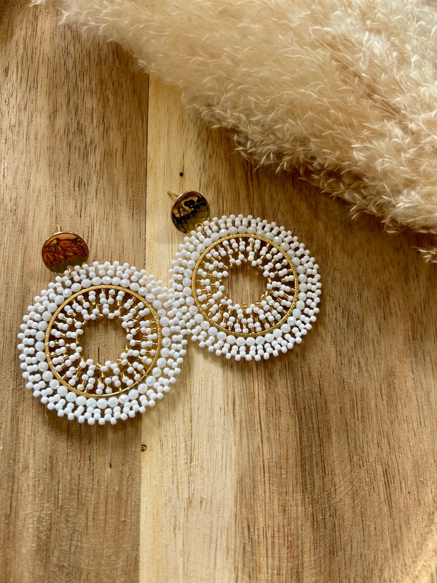 Boucles d'oreilles créoles avec perles